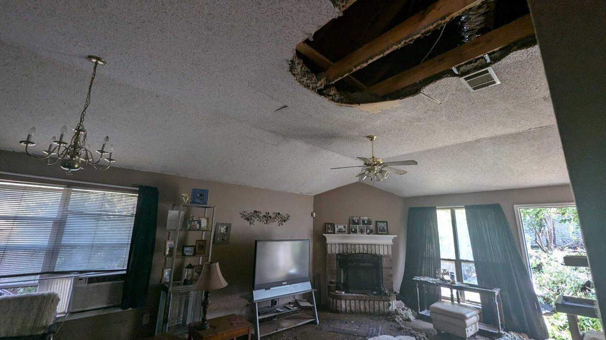 Susie Clark, who has lived at 8604 Trinity Vista Trail for 23 years, showed the Star-Telegram the damage to her living room. Clark said she came home to a “Yellowstone geyser” shooting onto her house.