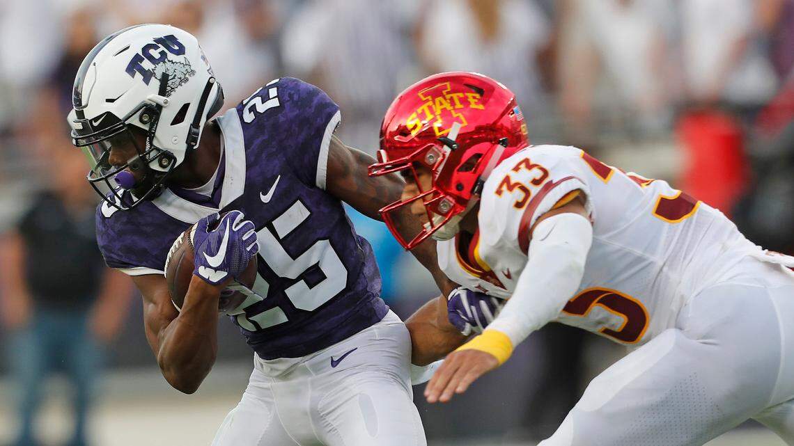 TCU wide receiver KaVontae Turpin (25) is brought down by Iowa State defensive back Braxton Lewis (33) in the second half of a NCAA college football game in Fort Worth, Texas, Saturday, Sept. 29, 2018.