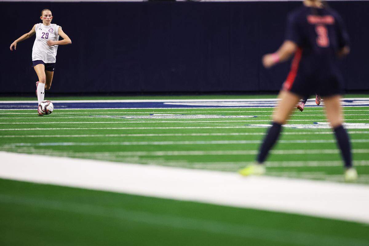 Grapevine defender Claire Jenkins (29) dribbles the ball up the field against Frisco Wakeland in a Class 5A Division II UIL girls soccer state semifinal at the Ford Center on April 3, 2026 in Frisco, Texas.