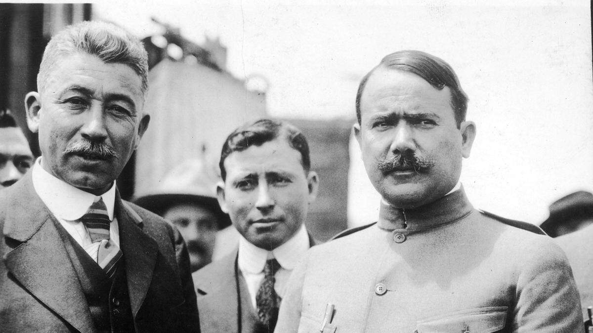 The future Mexican president, Gen. Álvaro Obregón, right, and Andres Garcia, Mexican Consul in El Paso, pose for a photo in 1916 during the Mexican Revolution.