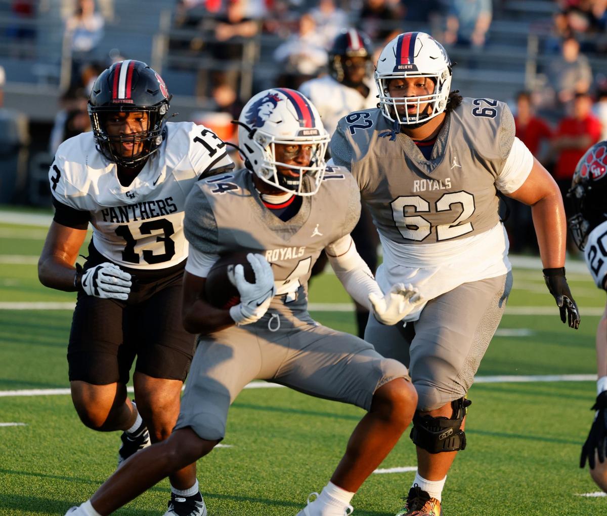Richland wide receiver Xavier Johnson (14) looks for an opening during a UIL football game at Birdville Fine Arts and Activity Center in North Richland Hills Friday, Sept. 6, 2024.