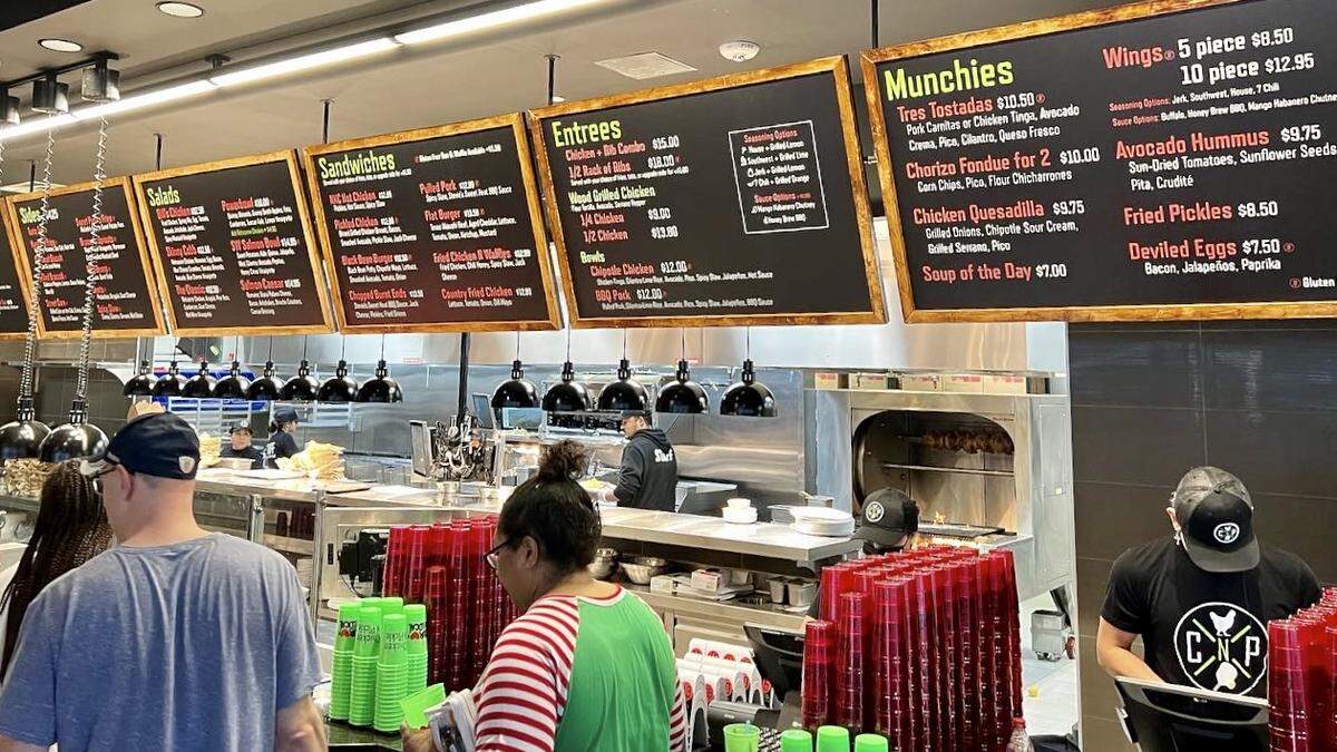 Chicken n Pickle’s wide menu is based around four flavors of wood-roasted chicken.
