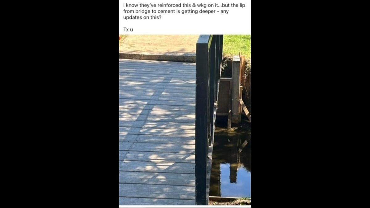 A screenshot of a Facebook post showing the gap between a foot bridge and concrete sidewalk