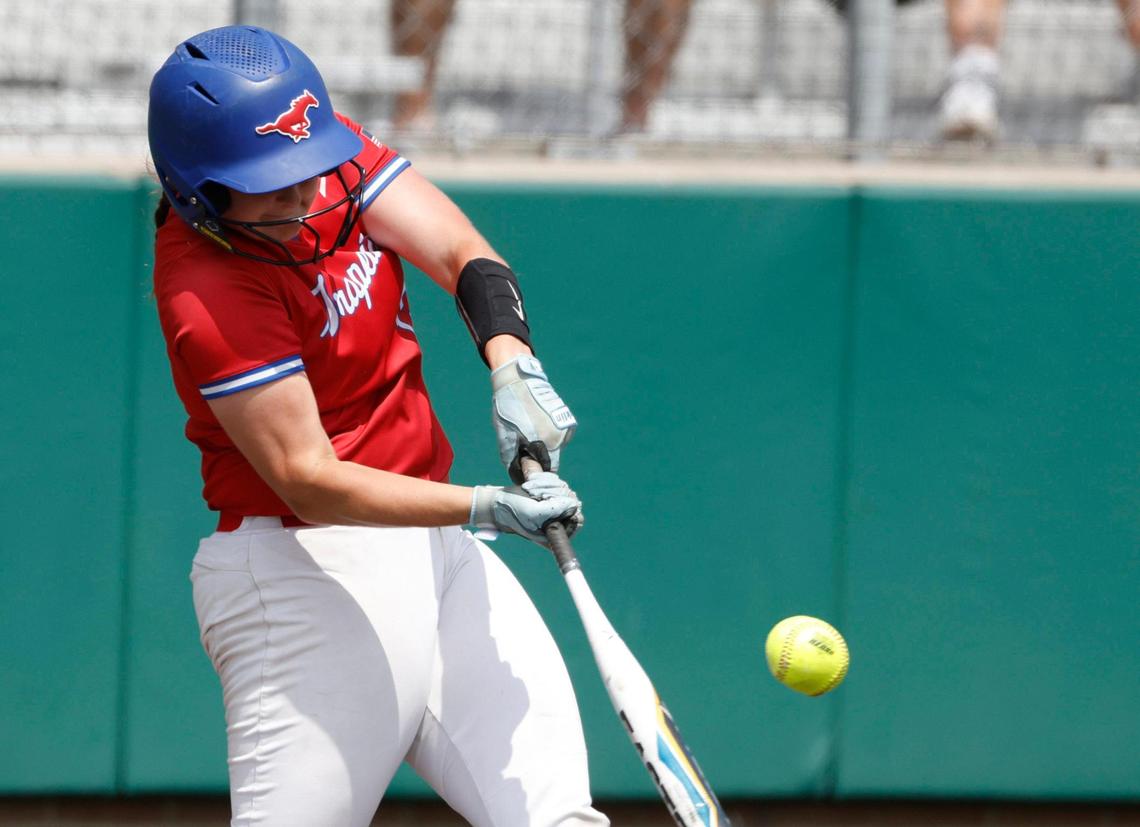 Grapevine first baseman Brynn Snyder (13) gets a hit down the third base line during game 2 of the UIL softball semifinal 5A D2 playoffs at The Rabbit Hole in Forney, Texas, Saturday, May 24, 2025.