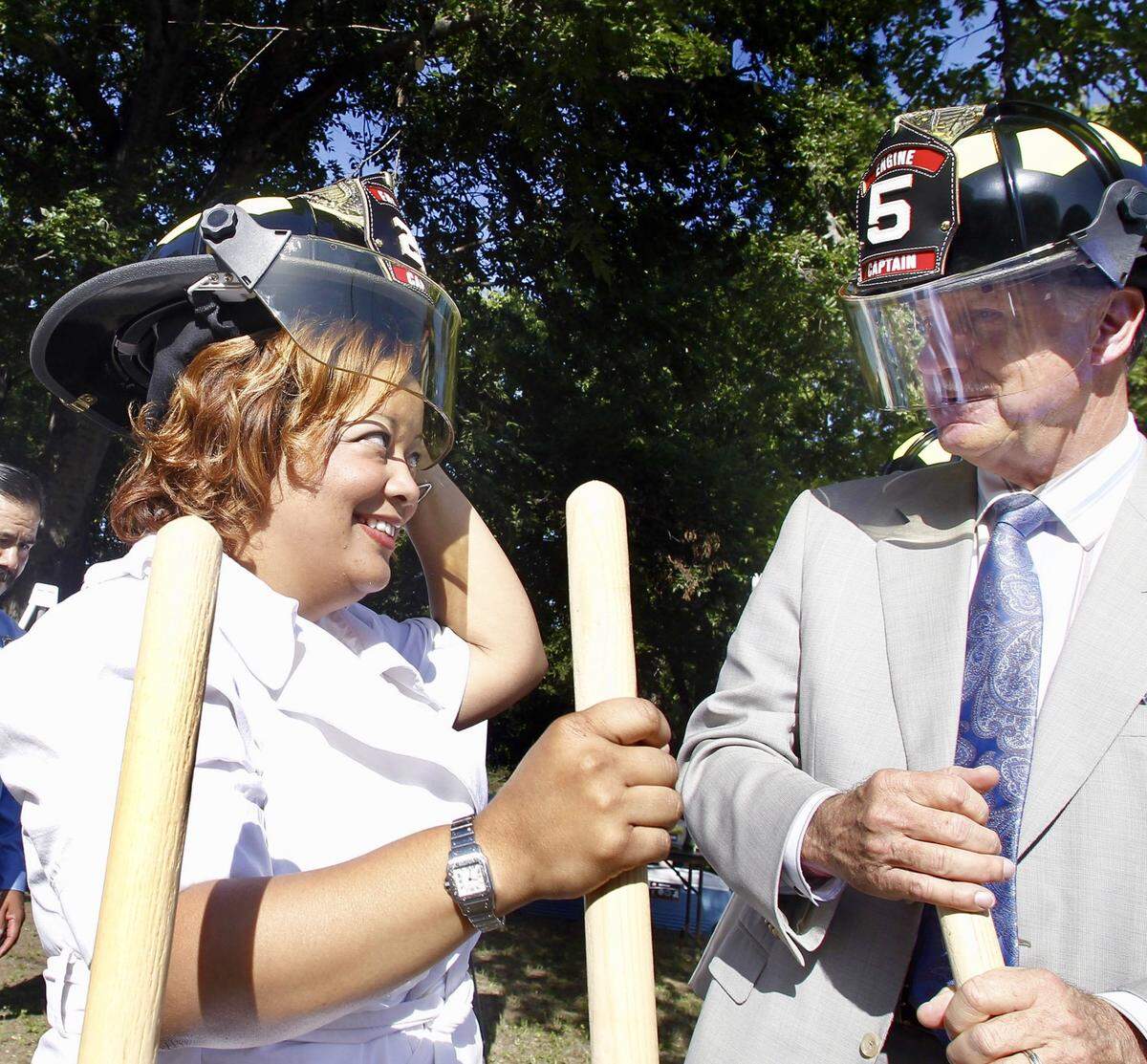 Councilwoman Kathleen Hicks and Mayor Mike Moncrief donned fire helmets in 2010 to break ground on a new fire station along the Evans Ave. corridor. (Star-Telegram/Ron T. Ennis)