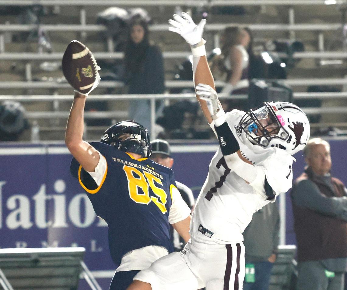 Stephenville wide receiver Jhett Banuelos (85) can’t quite haul in the ball defended by Brownwood defensive back Raven Prado (7) during a UIL District 4-4A D1 football game at Tarleton State Memorial Stadium in Stephenville, Texas, Friday, Nov. 01, 2024.