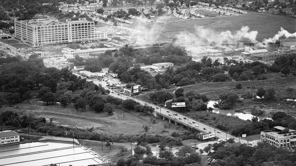 May 12, 1950: The Clear Fork river at West Seventh Street, with the Holly water treatment plant shown in the lower left. The Montgomery Ward building is seen in the distance.