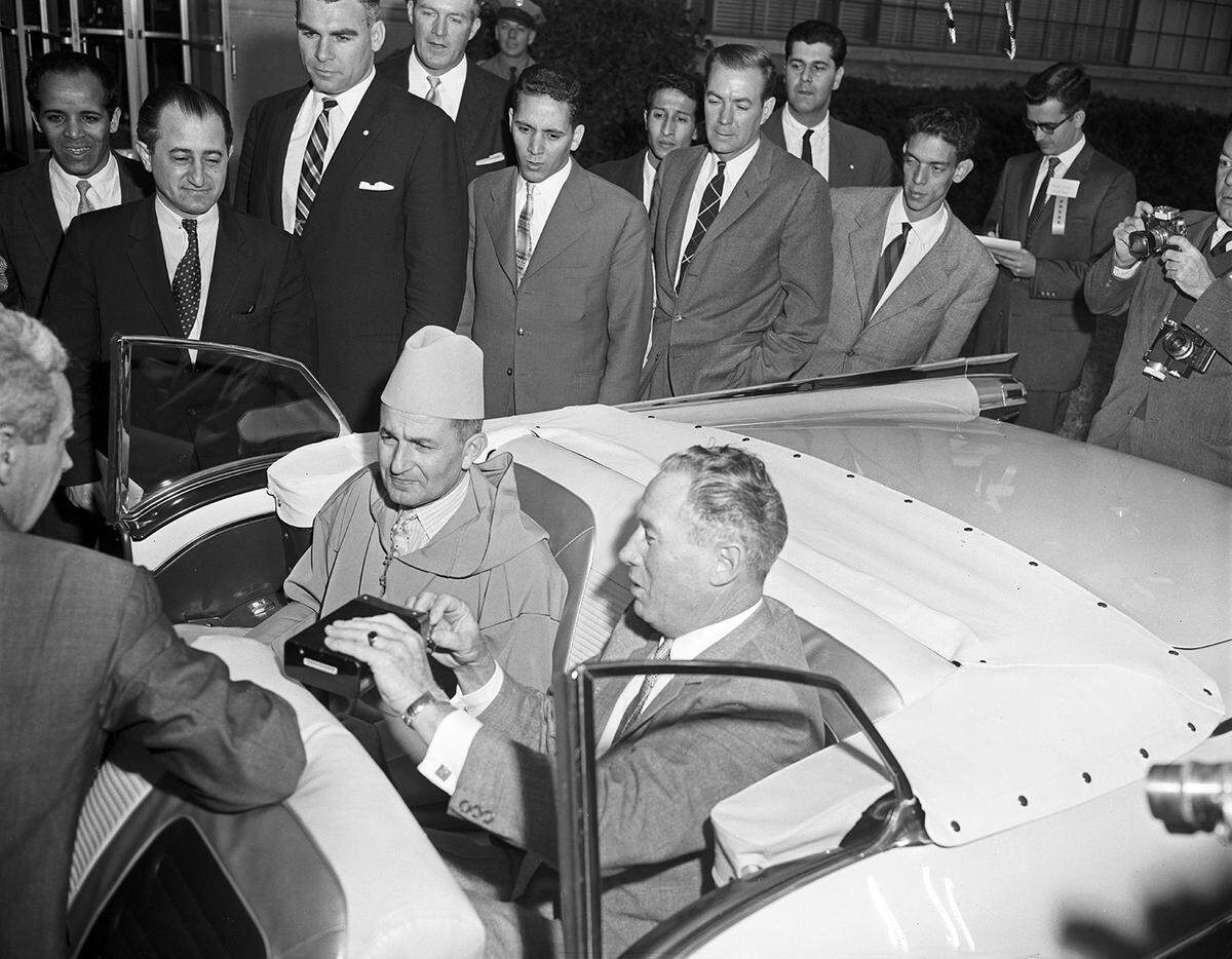 King Mohammed V and Prince Moulay Abdallah of Morocco visited the General Motors Plant in Arlington, Texas, with their interpreter Abderrahman Nagga. [FWST photographer Joe McAulay]