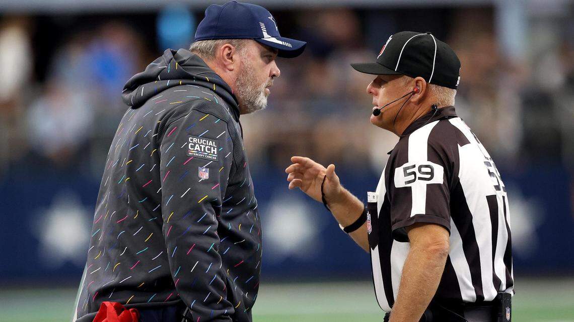 Dallas Cowboys coach Mike McCarthy, left, making his point to a referee during Sunday’s victory over Carolina, deserves plenty of the credit for the team’s 3-1 start according to owner Jerry Jones.