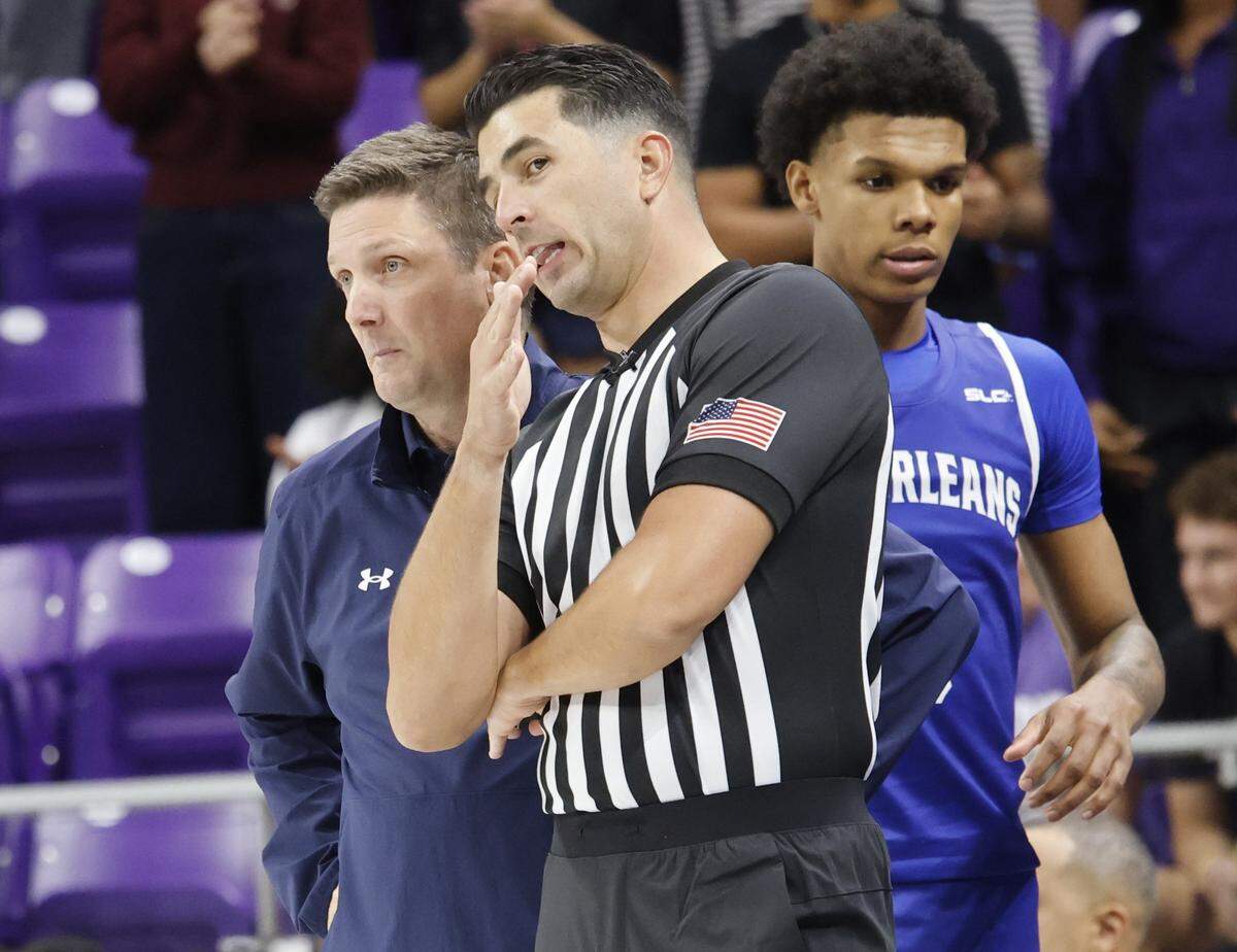 New Orleans head coach Stacy Hollowell talks with an official during the second half of a NCAA basketball game between New Orleans University and TCU at Schollmaier Arena in Fort Worth, Texas, Monday Nov. 03, 2025. The Horned Frogs dropped their home opener 78-74 to the Privateers.