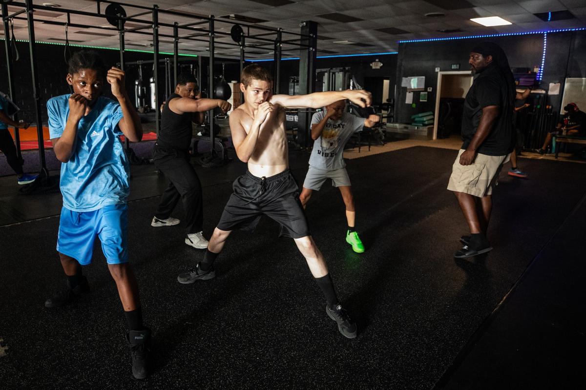 Youth boxers train with Golden Gloves champion Kendrick Releford Jr. on Wednesday, July 30, 2024, at Dream Performance in Fort Worth. Releford Jr. teaches the sport to youth boxers in hopes of bringing boxing back to high schools.