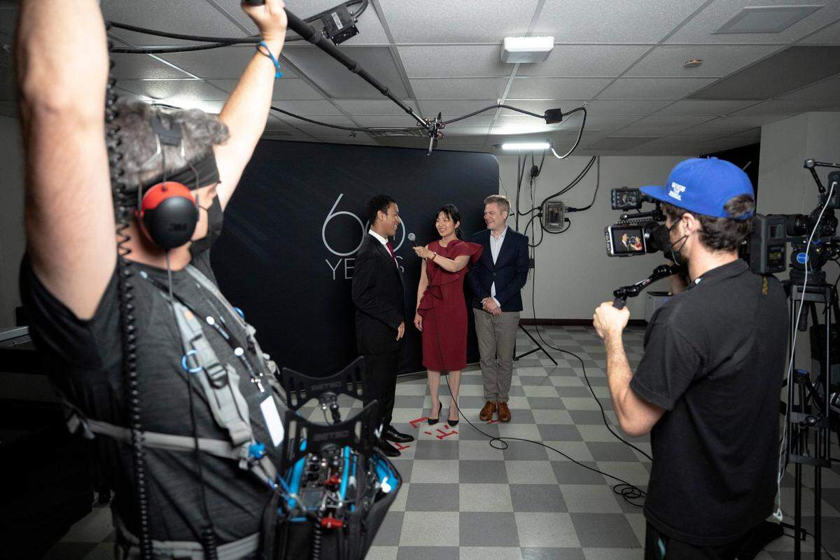 Surrounded by a documentary crew, Clayton Stephenson interviews after his performance in the 16th Cliburn International Piano Competition at Bass Performance Hall in Fort Worth, Texas, on Thursday, June 10, 2022.