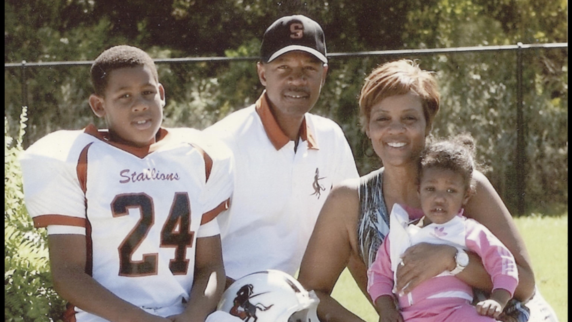 Ross Blacklock (left) with his family, including his father, Harlem Globetrotters coach Jimmy Blacklock.