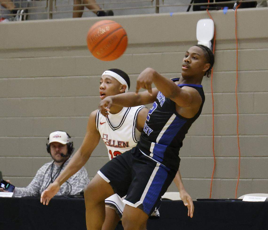 North Crowley guard Kameron Price (2) tosses the ball away from Allen's Bennett Mosley (13) on the sidelines during the second half of a UIL Class 6A Division I boys regional final basketball game at Thomas Coliseum in Haltom City, Texas, Friday, Mar. 06, 2026.