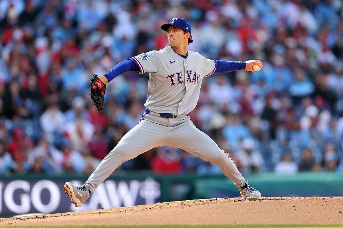 PHILADELPHIA, PENNSYLVANIA - MARCH 28: Jacob Latz #67 of the Texas Rangers throws a pitch in the first inning during a game against the Philadelphia Phillies at Citizens Bank Park on March 28, 2026 in Philadelphia, Pennsylvania. (Photo by Hunter Martin/Getty Images)