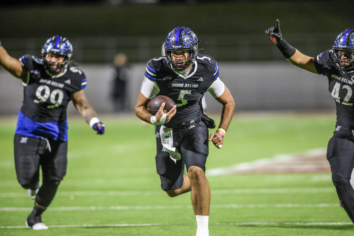 Byron Nelson quarterback Parker Almanza runs for a 26-yard touchdown against Denton Guyer in a Class 6A Division II regional semifinal Friday, Nov. 28, 2025, at Northwest ISD Stadium in Justin, Texas.