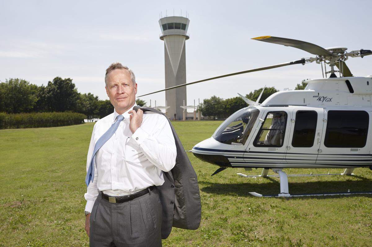 In this recent photo, Ross Perot Jr. stands in front of the air traffic control tower at Perot Field Fort Worth Alliance Airport, which was the world’s first industrial airport when it opened in 1989.