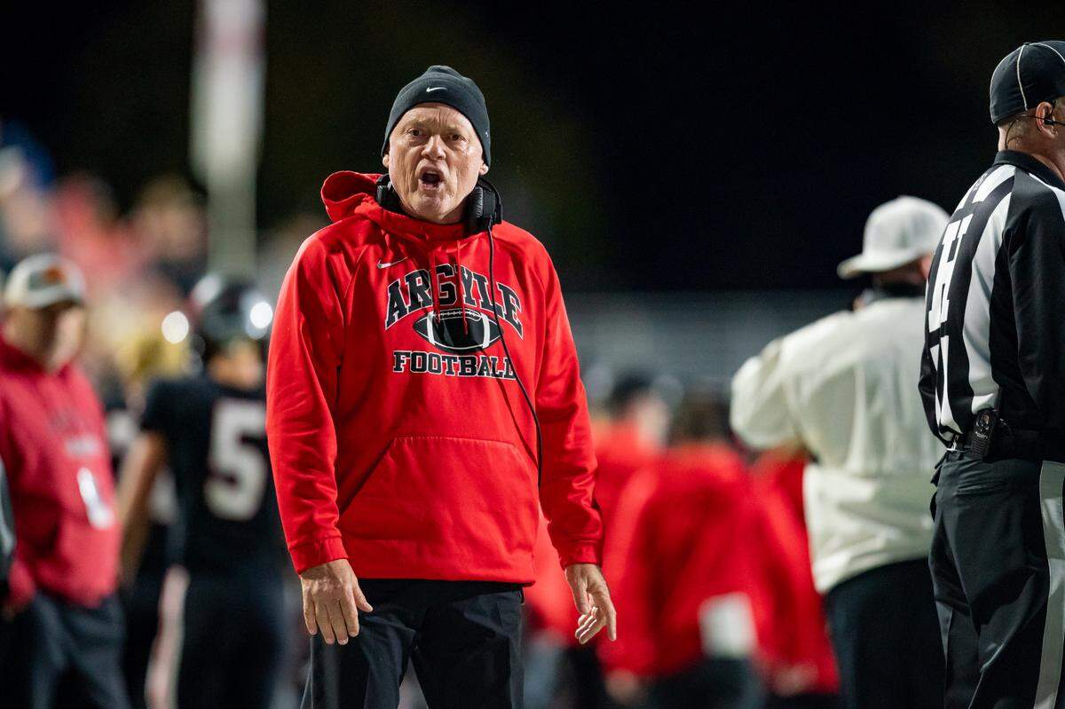 Argyle head coach Todd Rodgers gives directions on the sideline in a playoff game against Colleyville Heritage.