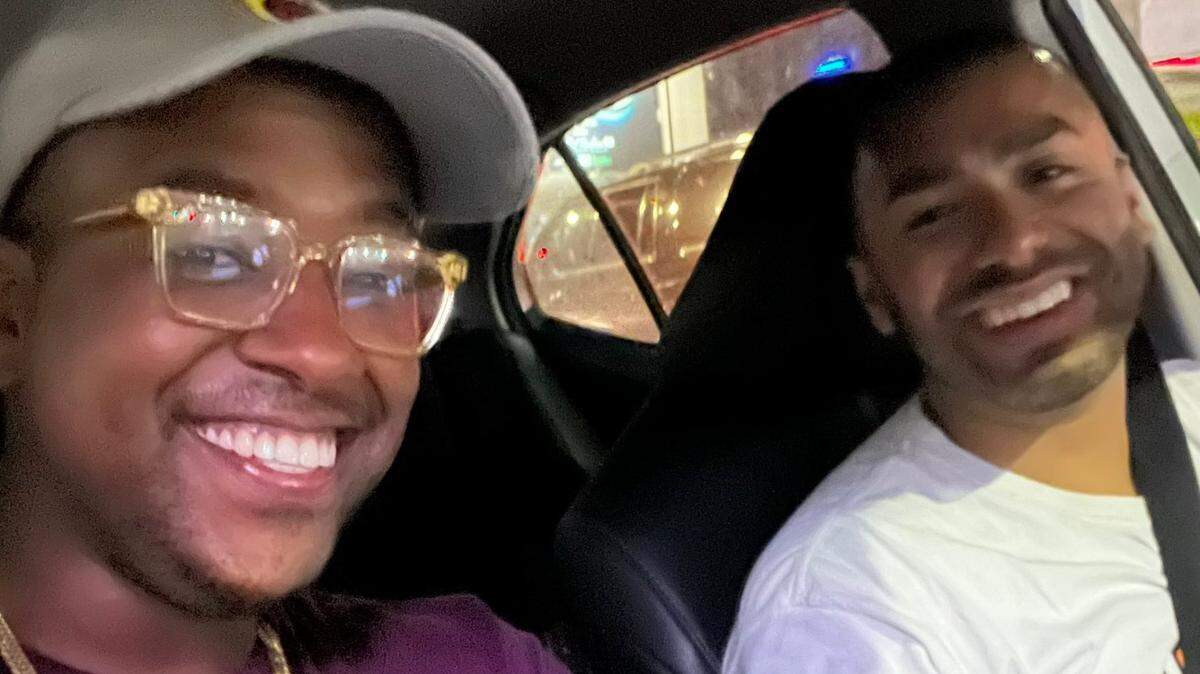 Bradford William Davis poses for a selfie with his friend, scholar and budding activist Job Garcia, while sitting in Garcia's car.