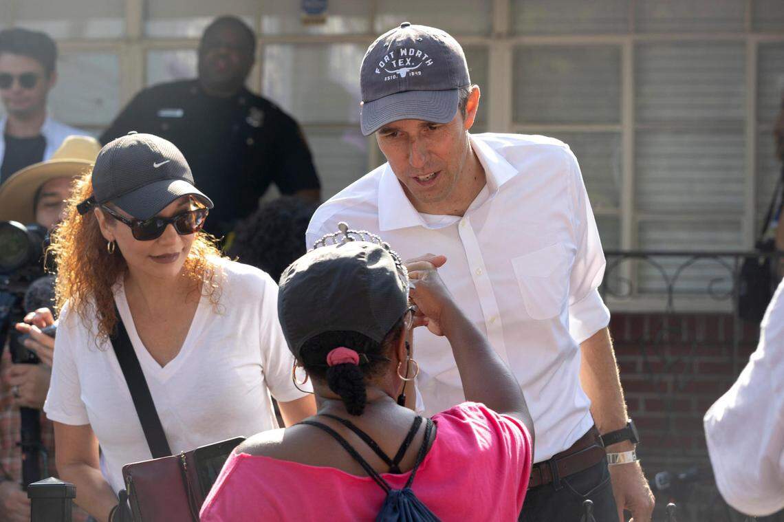 Beto O’Rourke takes a photo with a supporter in Fort Worth, Texas, on Saturday, June 18, 2022. The politician marched with Juneteenth activist Opal Lee 2.5 miles across the city in support of the federal holiday.