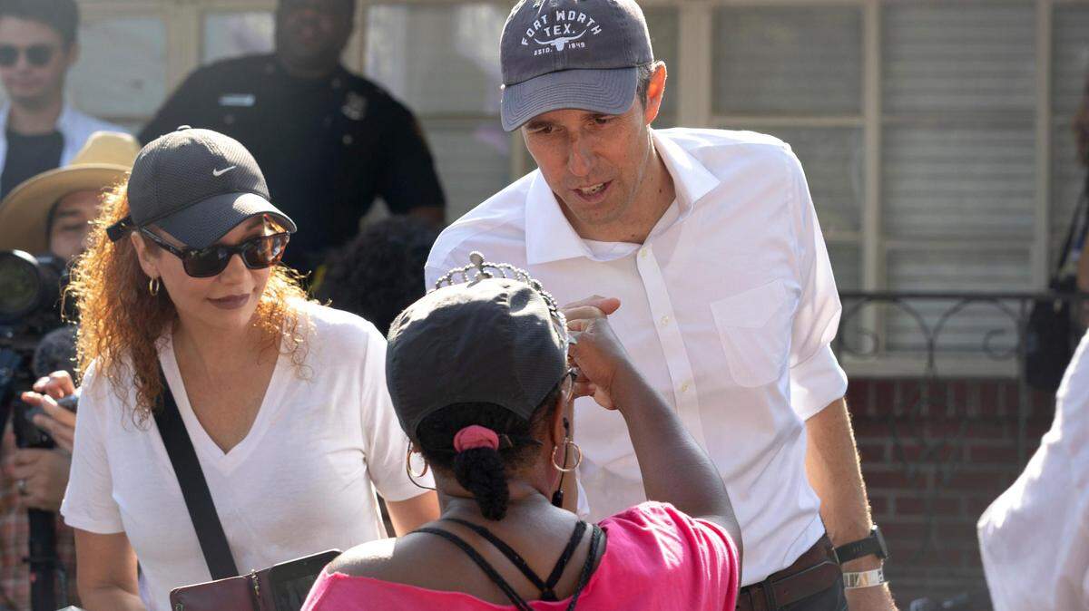 Beto O’Rourke fist bumps a supporter in Fort Worth, Texas, on Saturday, June 18, 2022. The politician marched with Juneteenth activist Opal Lee 2.5 miles across the city in support of the federal holiday.