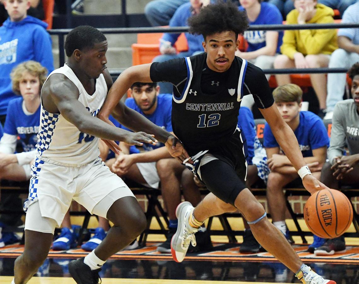 Burleson Centennial’s Tayton Conerway, right, drives to the basket against Brewer’s Devin Avent in the second quarter of their 5A Area Championship basket ball game Friday, February 28, 2020 at Aledo High School in Aledo. Texas. Centennial went on to win 75-70. Special/Bob Haynes