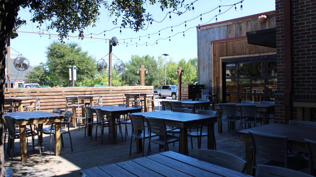 Flips Patio Grill has a large patio with TVs and fans which is ideal to take advantage of the 80 degree Texas weather.