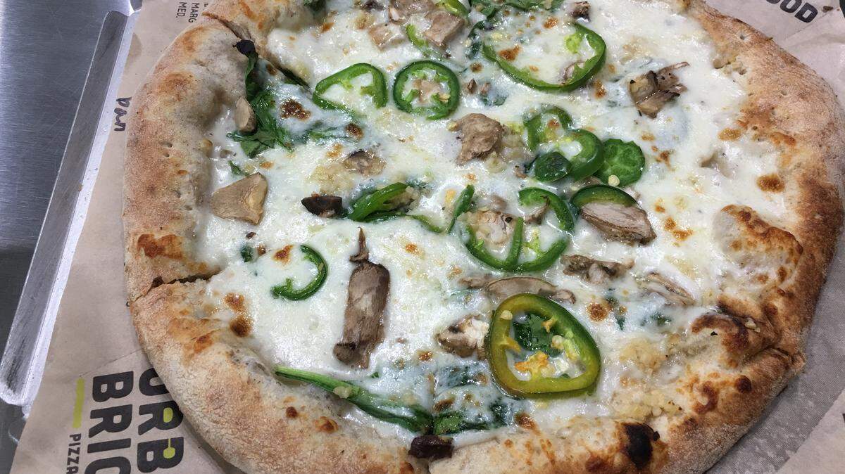White mushroom pizza from Urban Bricks, which closed an Arlington location in December after less than a year in Champions Park.