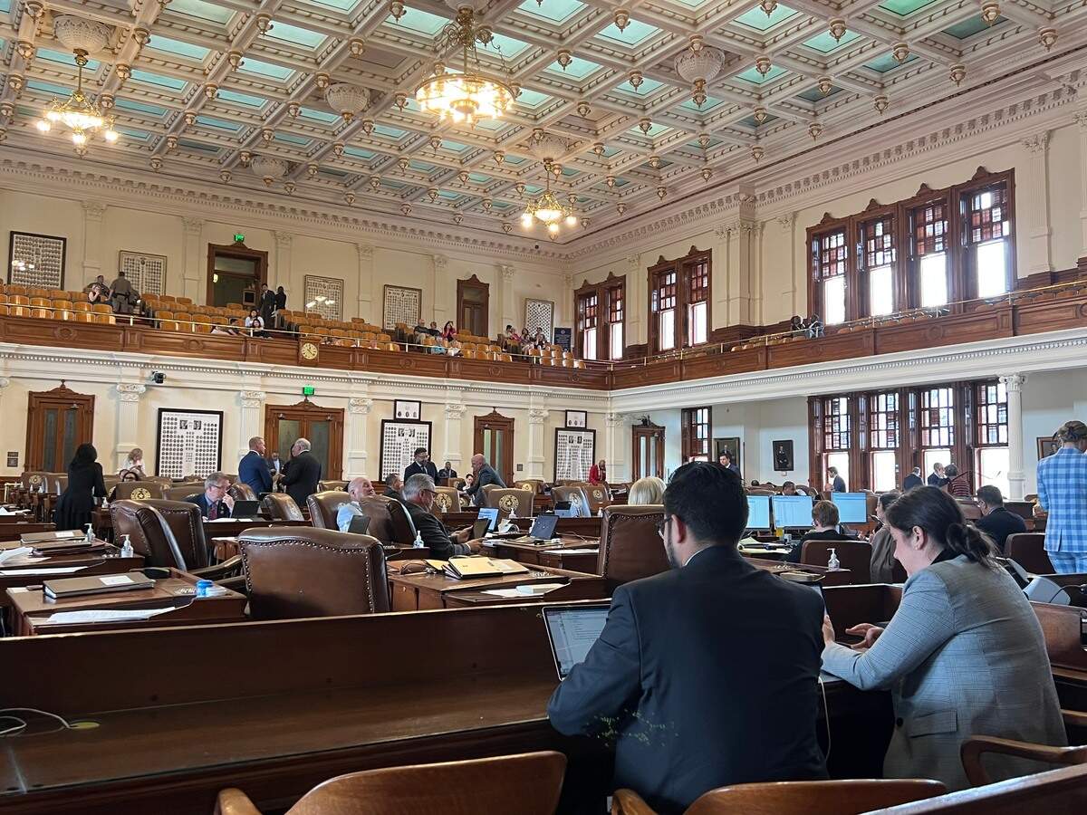 Chairs sit empty at the press table in the Texas House chamber at midday May 24, 2023.