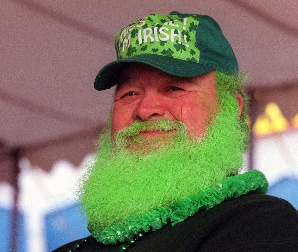 March 17, 2003: Mike Harris dyed his beard green in honor of St. Patrick’s Day and sells T-shirts at the J. Gilligan’s St. Patrick’s Day festivities in Arlington.