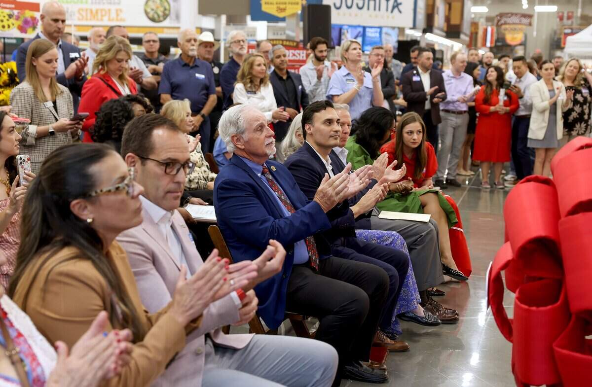 Local officials and dignitaries attend the ribbon cutting ceremony for the new Mid-Cities H-E-B on Tuesday, May 19, 2026. The popular Texas grocery store will open to the public on May 20.