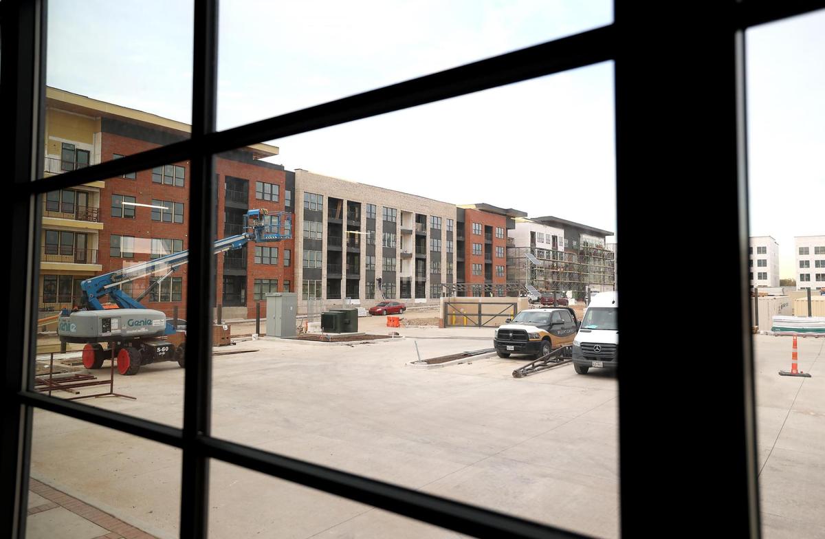 Construction on apartments developed by Kairoi’ can be seen from the renovated Armour building in the Fort Worth Stockyards on Friday, Dec. 6, 2024.