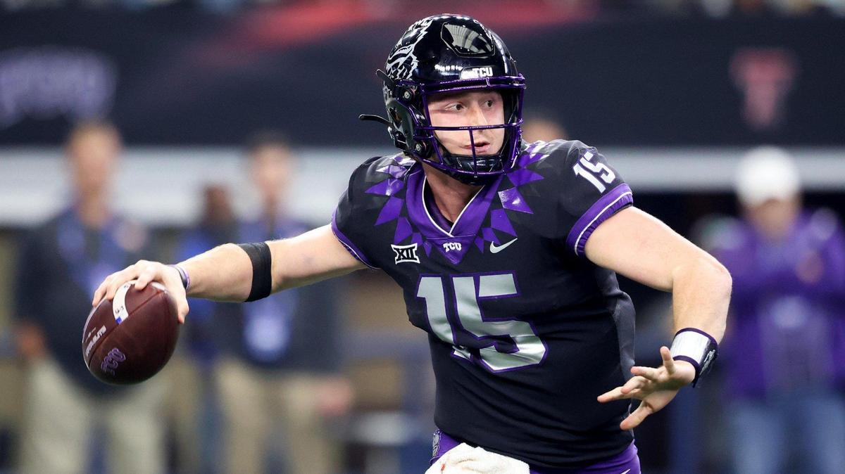TCU quarterback Max Duggan scrambles after pressure from the Kansas State defense during the 2022 Dr. Pepper Big 12 Championship on Saturday, December 3, 2022.