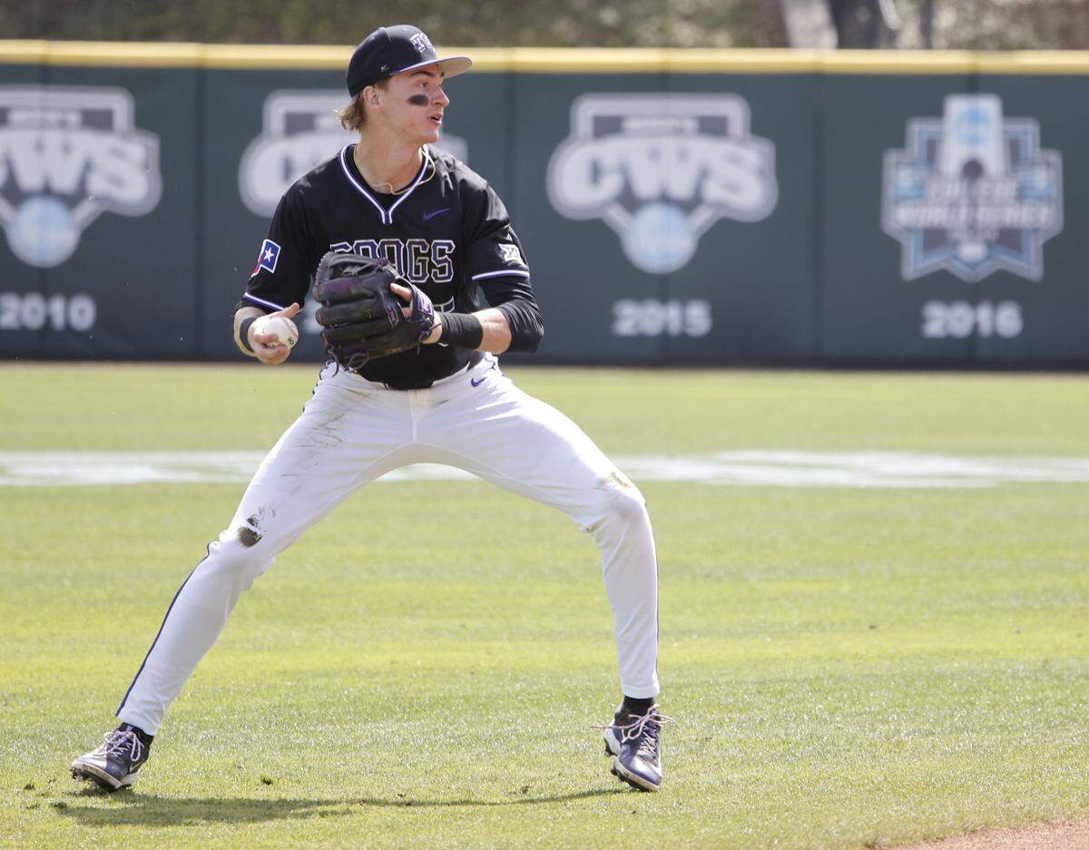 TCU infielder Lucas Franco (5) makes the toss to first during an NCAA baseball game against New Mexico State at Lupton Field at TCU in Fort Worth, Texas, Tuesday, March, 17, 2026.