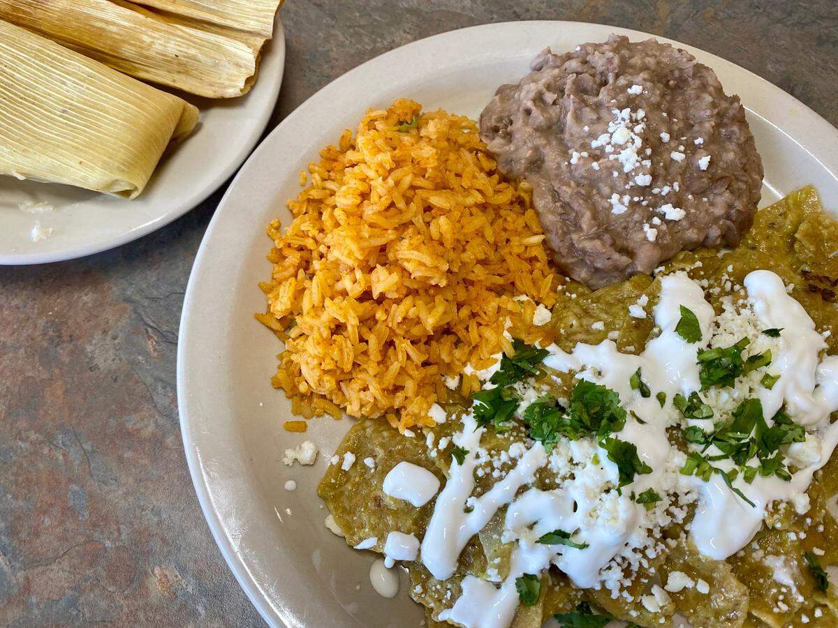 Chilaquiles verdes and tamales at La Casa de Lina as seen Dec. 23, 2019.