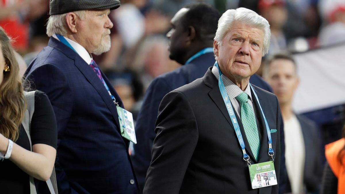In this file photo, Terry Bradshaw, left, and Jimmy Johnson watch teams warm up. Both men always have plenty to say about the Cowboys each week.