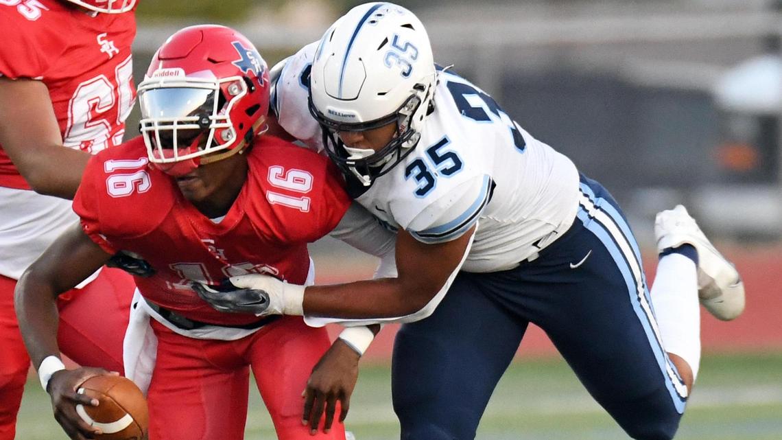 Sam Houston quarterback Andre Saulsbury, left is sacked by Bell’s Tristan Johnson in the second quarter of Friday’s September 9, 2022 football game at Wilemon Field in Arlington, Texas. Special/Bob Haynes