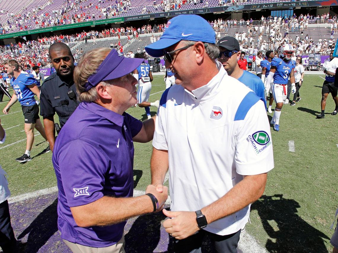 TCU’s former head coach Gary Patterson congratulates SMU’s then head coach Sonny Dykes after the Mustangs beat the Horned Frogs, 42-34, on Sept. 25 at Amon G. Carter Stadium in Fort Worth. (Special to the Star-Telegram Bob Booth)