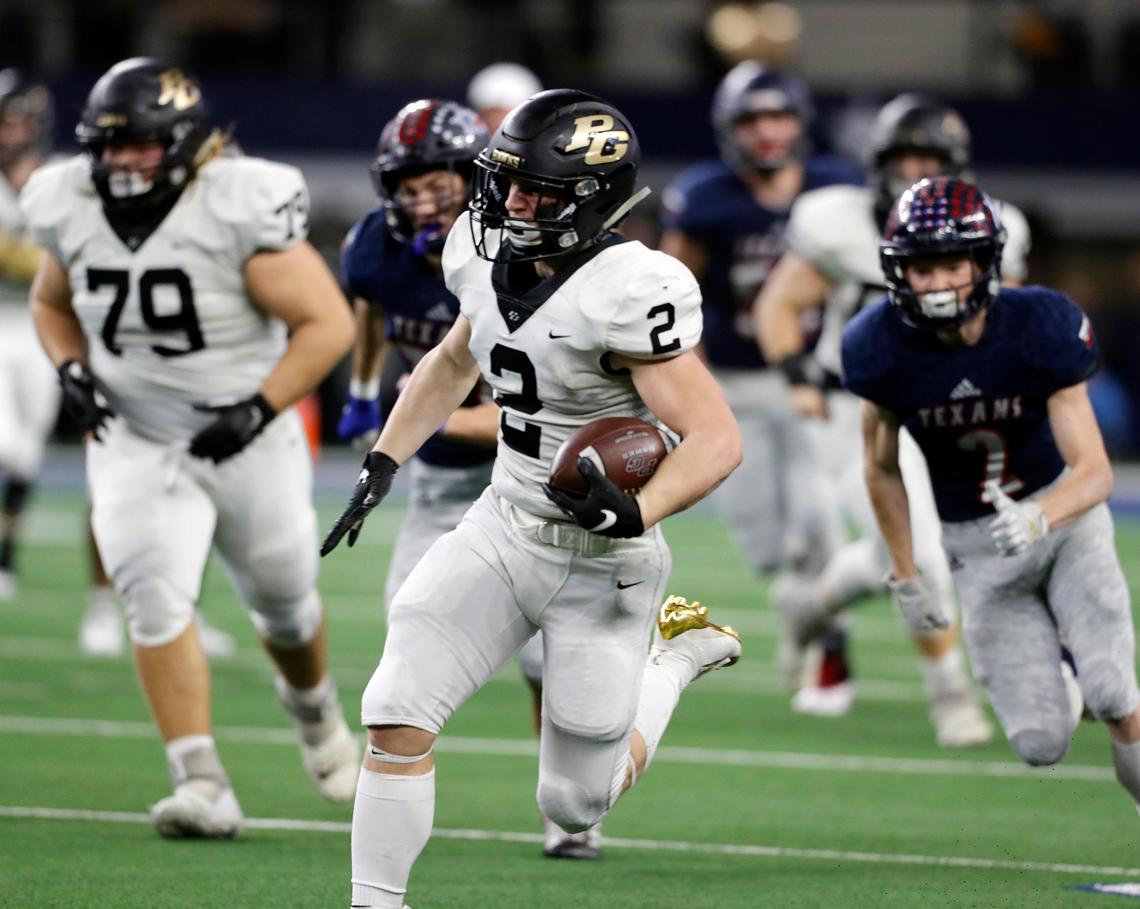 Offensive MVP Pleasant Grove running back Bruce Garrett (2) gains long yardage up the middle during the second half of a Conference 4A division II State Championship football game at AT&T Stadium in Arlington, Texas, Friday, Dec. 20, 2019. Pleasant Grove defeated Wimberly 35-21. (Special to the Star-Telegram Bob Booth)