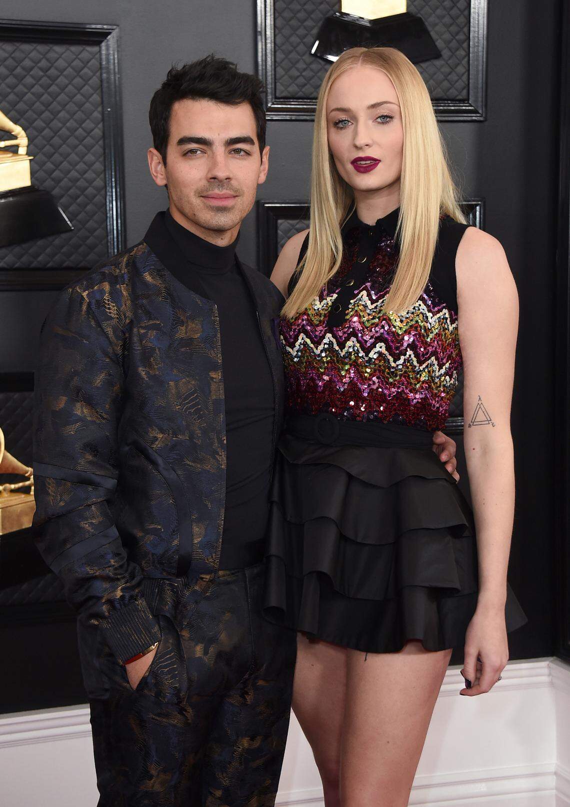 FILE - Joe Jonas, left, Sophie Turner arrive at the 62nd annual Grammy Awards in Los Angeles on Jan. 26, 2020. (Photo by Jordan Strauss/Invision/AP, File)