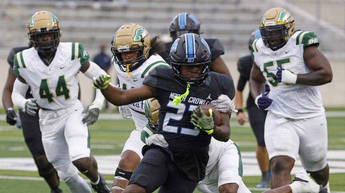 North Crowley running back Kiante Ingram (23) outruns the DeSoto defensive line during the first half of a UIL football game between DeSoto and North Crowley at Crowley ISD Multi-Purpose Stadium in Fort Worth, Texas, Friday, Sept. 05, 2025.