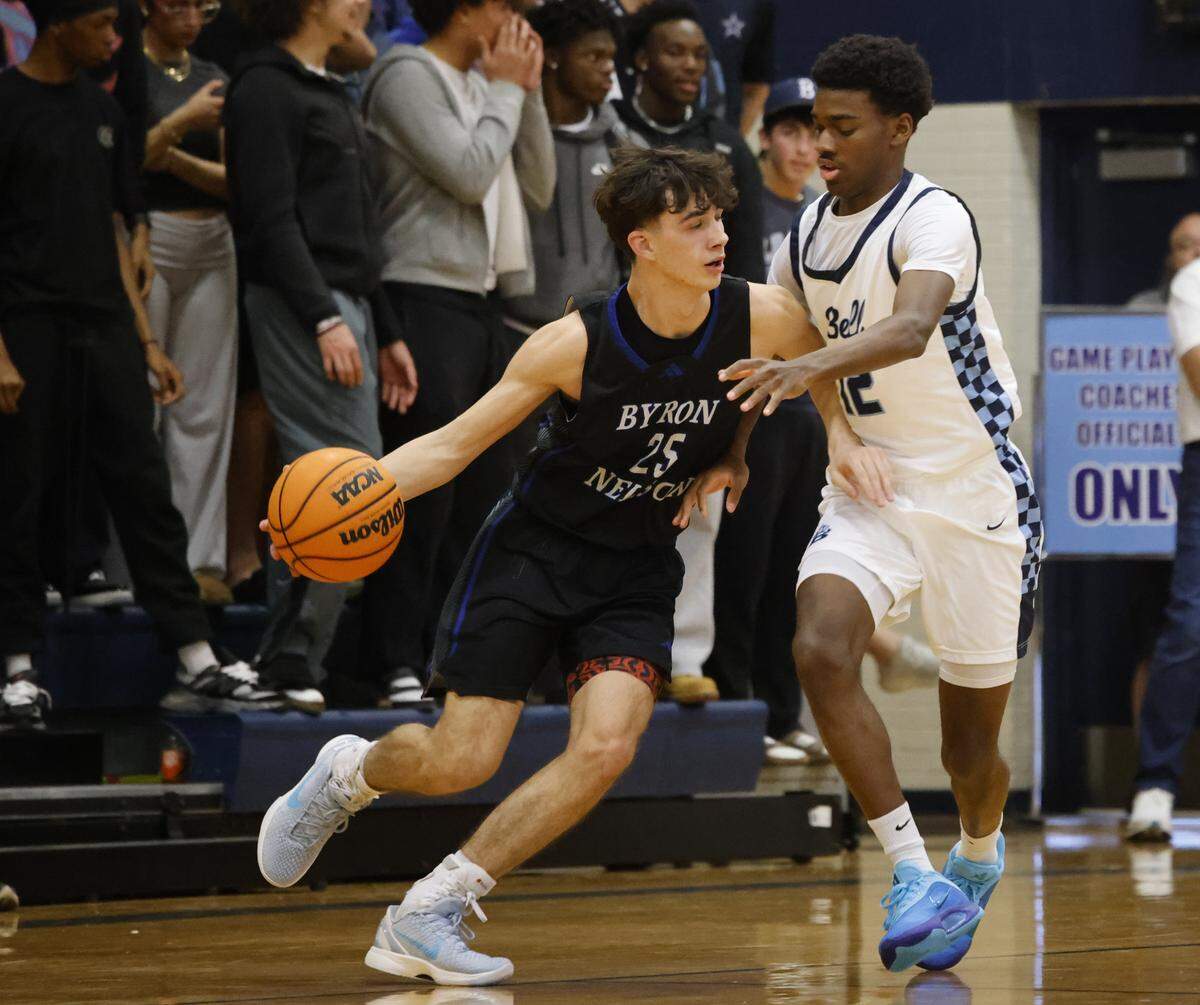 Byron Nelson guard Braylon Edwards (25) drives against L.D. Bell point guard Andrew Mull (12) during the first half of a boys UIL basketball game between Byron Nelson and L.D. Bell at L.D. Bell High School in Hurst, Texas, Friday Feb. 06, 2026