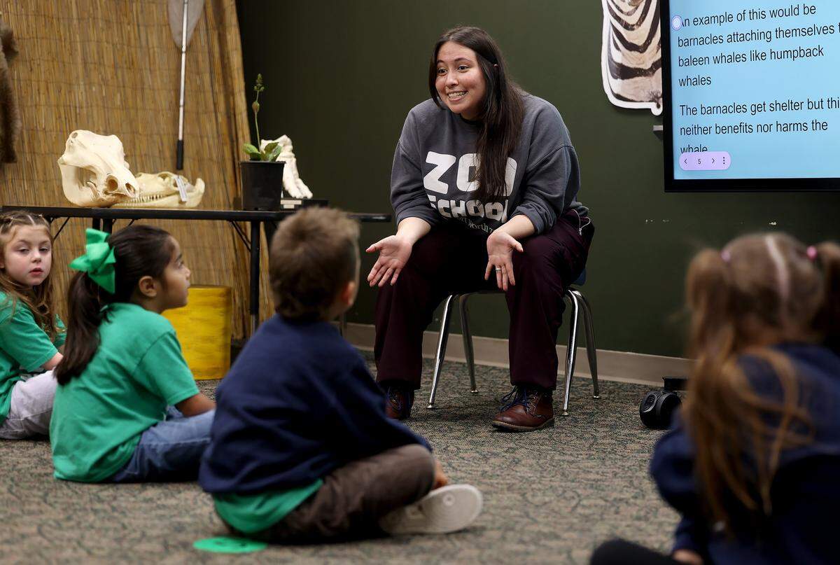 Teacher Elaine Barron gives a lesson during Zoo School on Thursday, April 30, 2026. Barron taught the preschool-age children about commensalism, predation and interdependence.