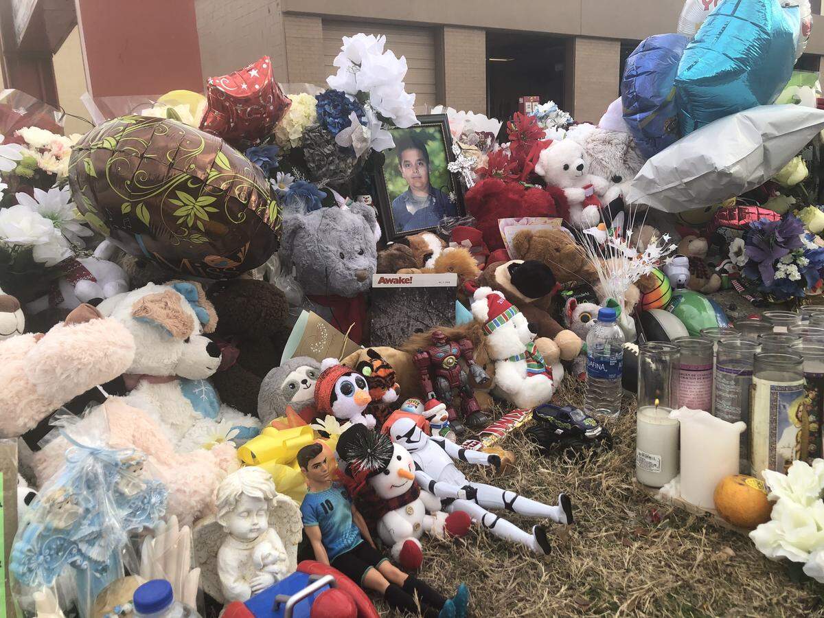 Victor Garcia, 12, died when he pushed his mother and nephew out of the way of a van that hit him on the sidewalk on Dec. 23 on  South San Josey Lane in Carrollton. A make-shift memorial was erected near the spot he was hit.