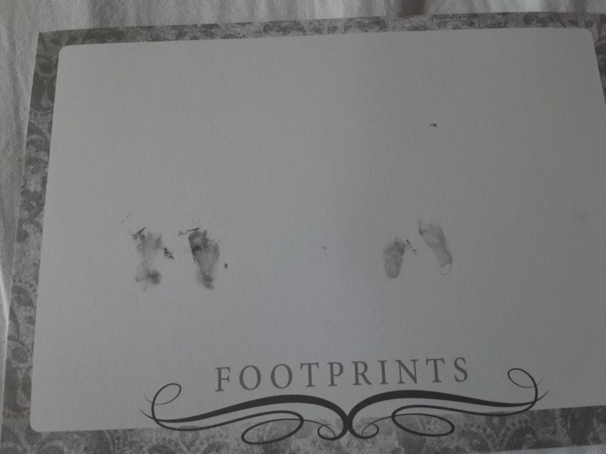 Lauren Kent received stamps of her child’s footprints after she gave birth to her stillborn baby, Dakota Lee, at Collin County Jail.