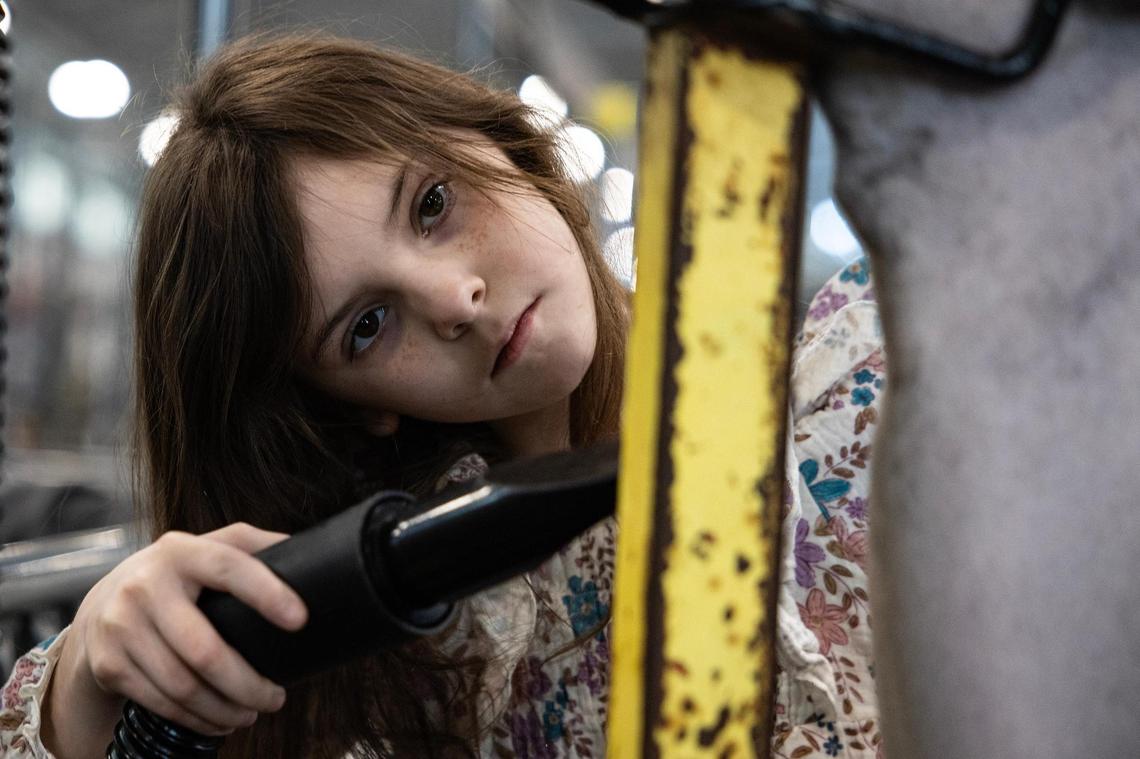 Rayleigh Whitt, 10, of Hoffman County 4H grooms her show sheep Cali the day prior to competing in the Fort Worth Stock Show & Rodeo in Fort Worth on Saturday, Jan. 25, 2025. Whitt is one of the youngest competitors at the stock show this year and is being mentored by her grandfather Samuel Adams and her student mentor Chylee Moore of Crandall FFA.