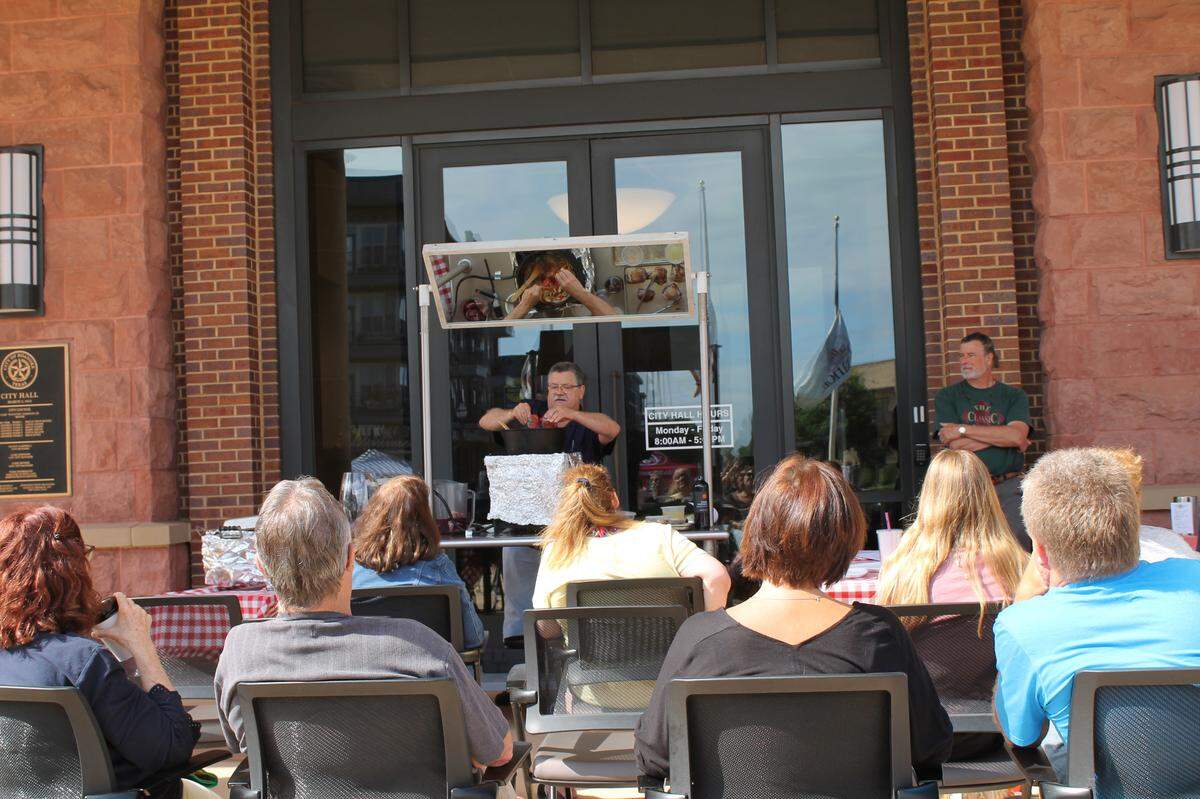 A cooking demonstration is held at the Roanoke Farmers Market.