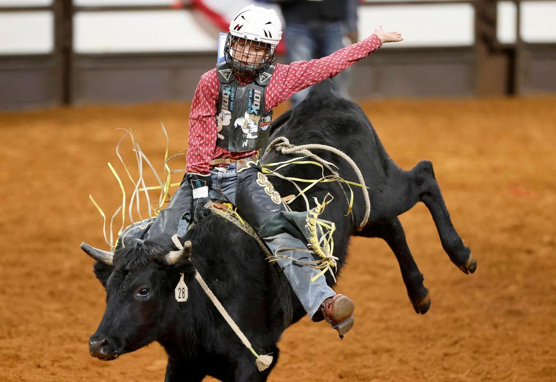 RJ Jackson of Terrell competes in the junior bull riding event of the Cowboys Color Rodeo on Monday, Jan. 20, 2025, at the Fort Worth Stock Show & Rodeo.