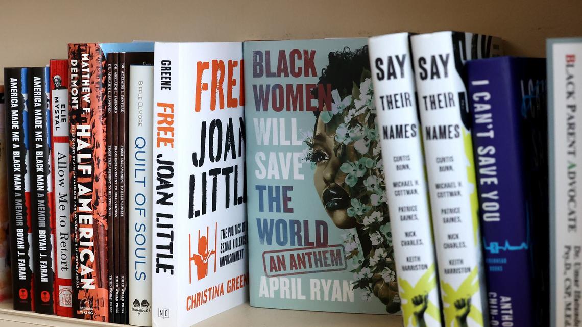 Books line the shelves of The Dock Booskshop in east Fort Worth on Friday, May 3, 2023. The book store is owned by sisters Donya and Donna Craddock and is the largest full-service Black-owned bookstores in Texas and the Southwest.