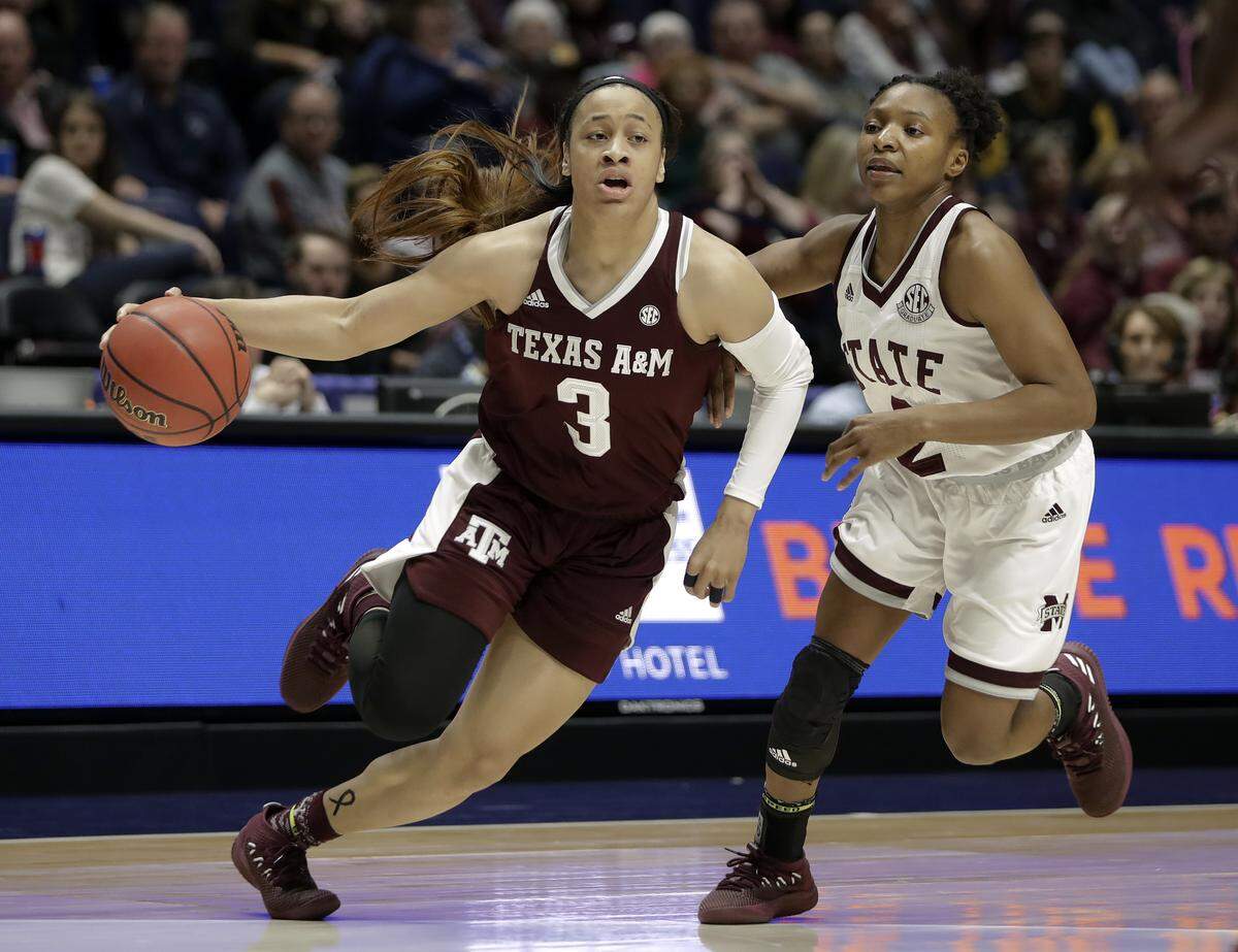 Texas A&M’s Chennedy Carter drives against Mississippi State’s Morgan William in the SEC tournament semifinal game. Carter, a Mansfield Timberview graduate, was USA Today’s selection for women’s freshman of the year.